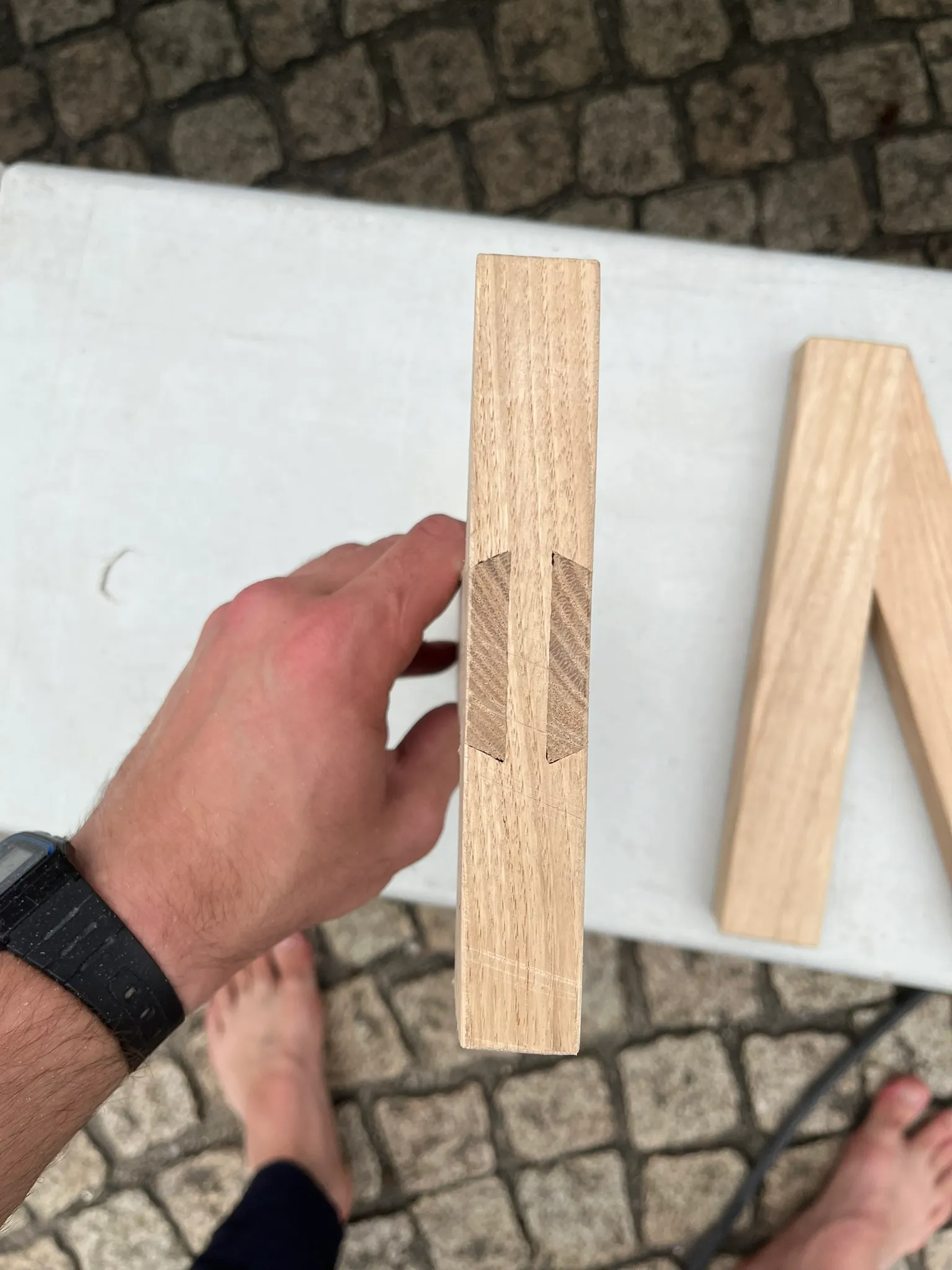 Assemblage à 2 queues d'aronde coulissantes